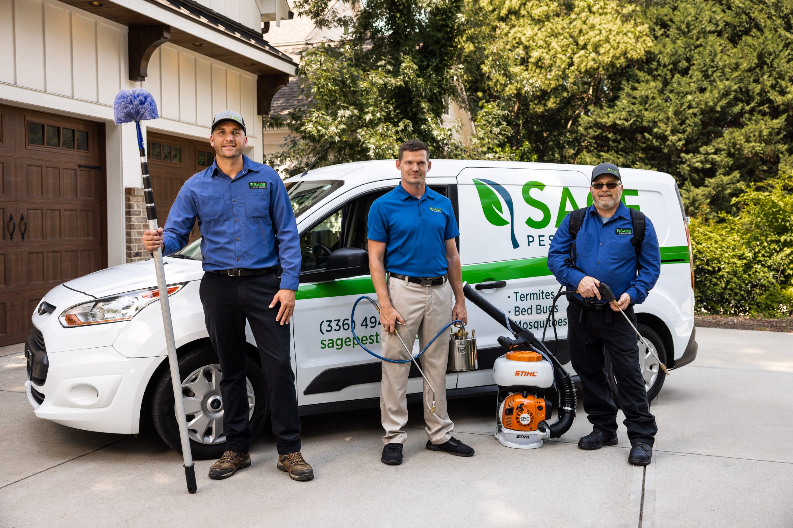 Sage pest control team members during a job